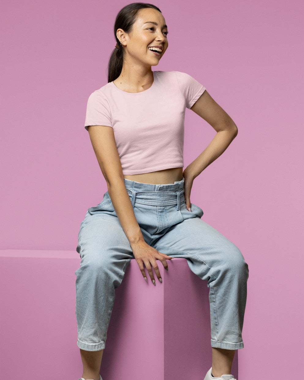 Female Model wearing the Green plain Crop Top for a casual look.
