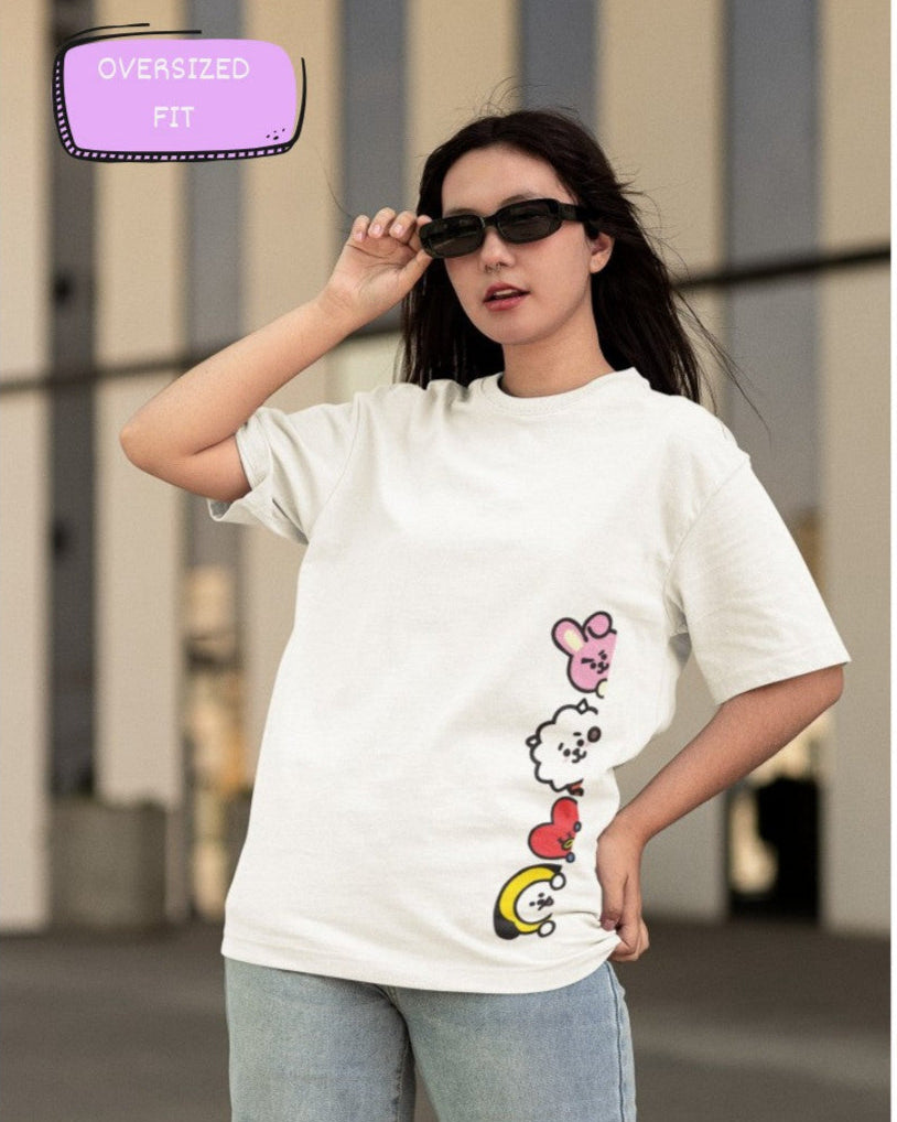 Female Model wearing the Peeking Army printed White oversized t-shirt paired with jeans for a casual look
