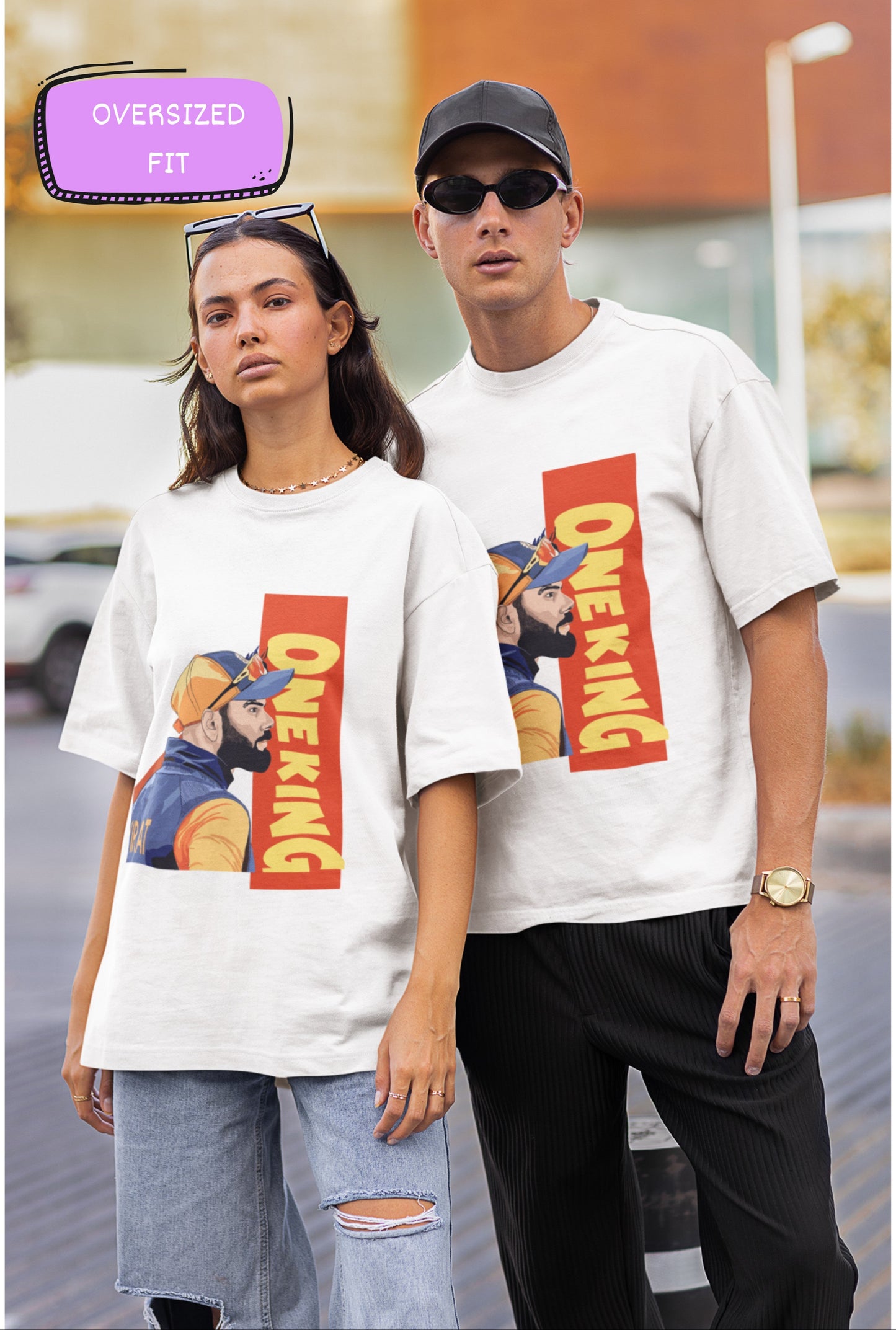 White oversized T-shirt showcasing a dynamic "One King Kohli" graphic design, perfect for making a bold style statement.