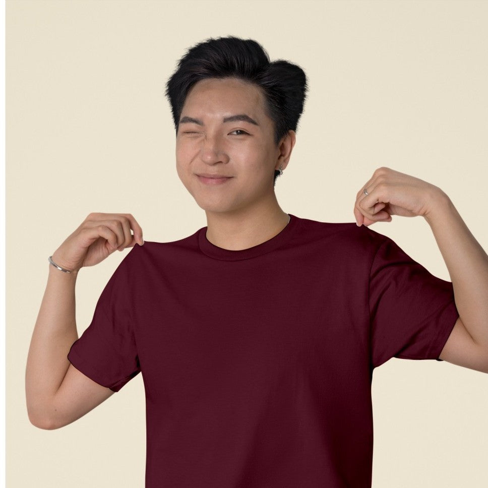 Male Model wearing the Maroon plain t-shirt.