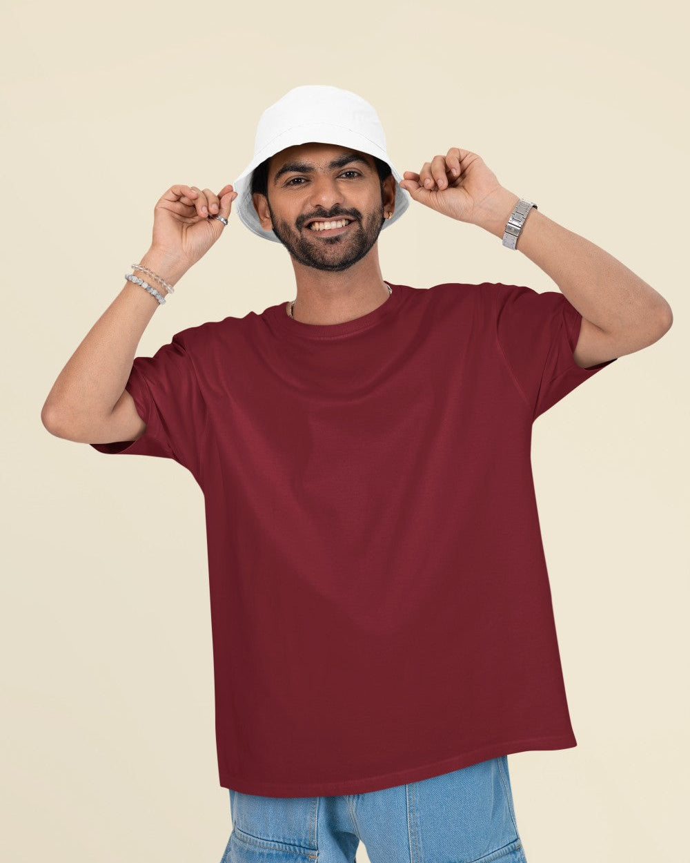Male Model wearing the Maroon oversized plain t-shirt for a casual look.