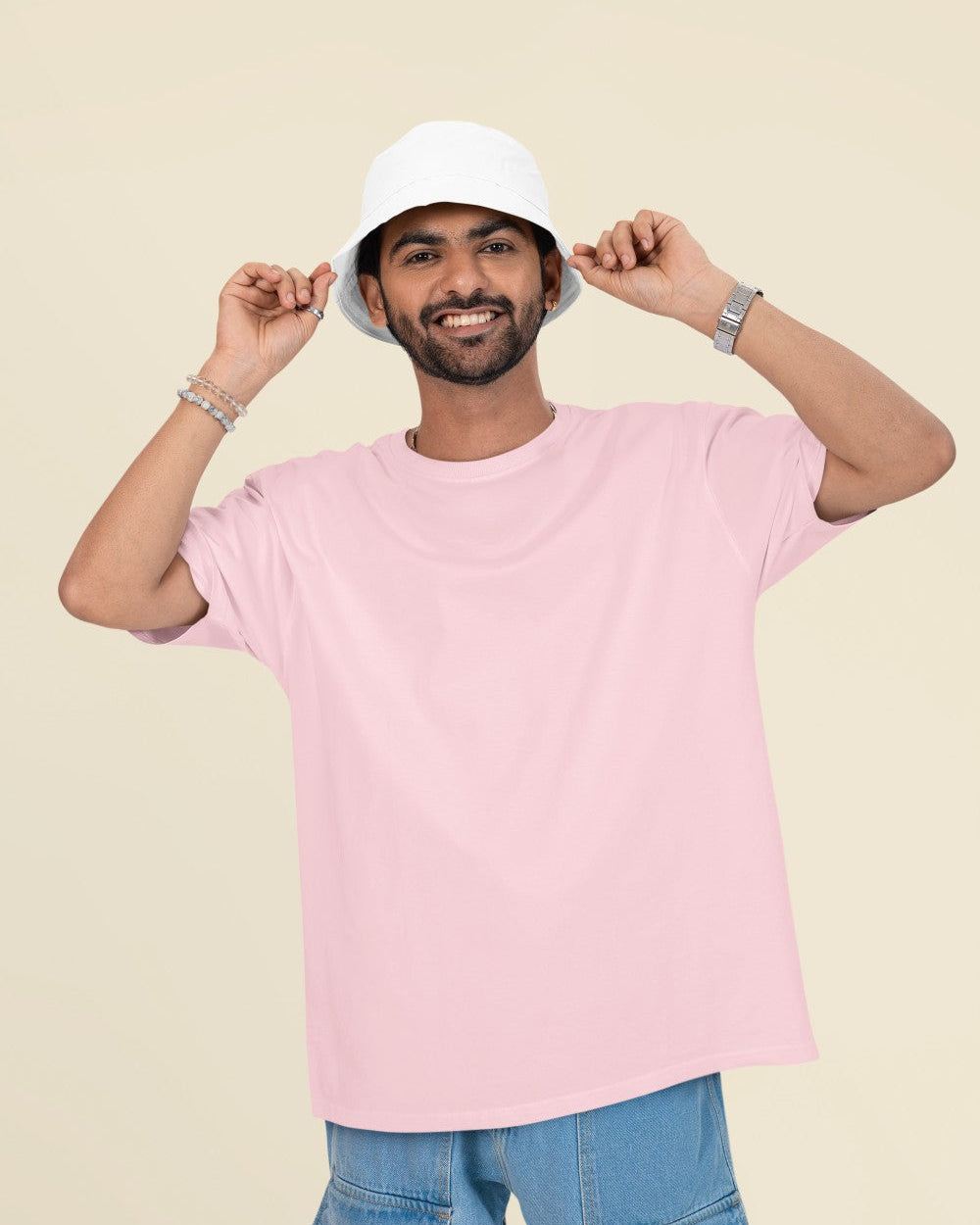 Male Model wearing the Pink oversized plain t-shirt for a casual look.