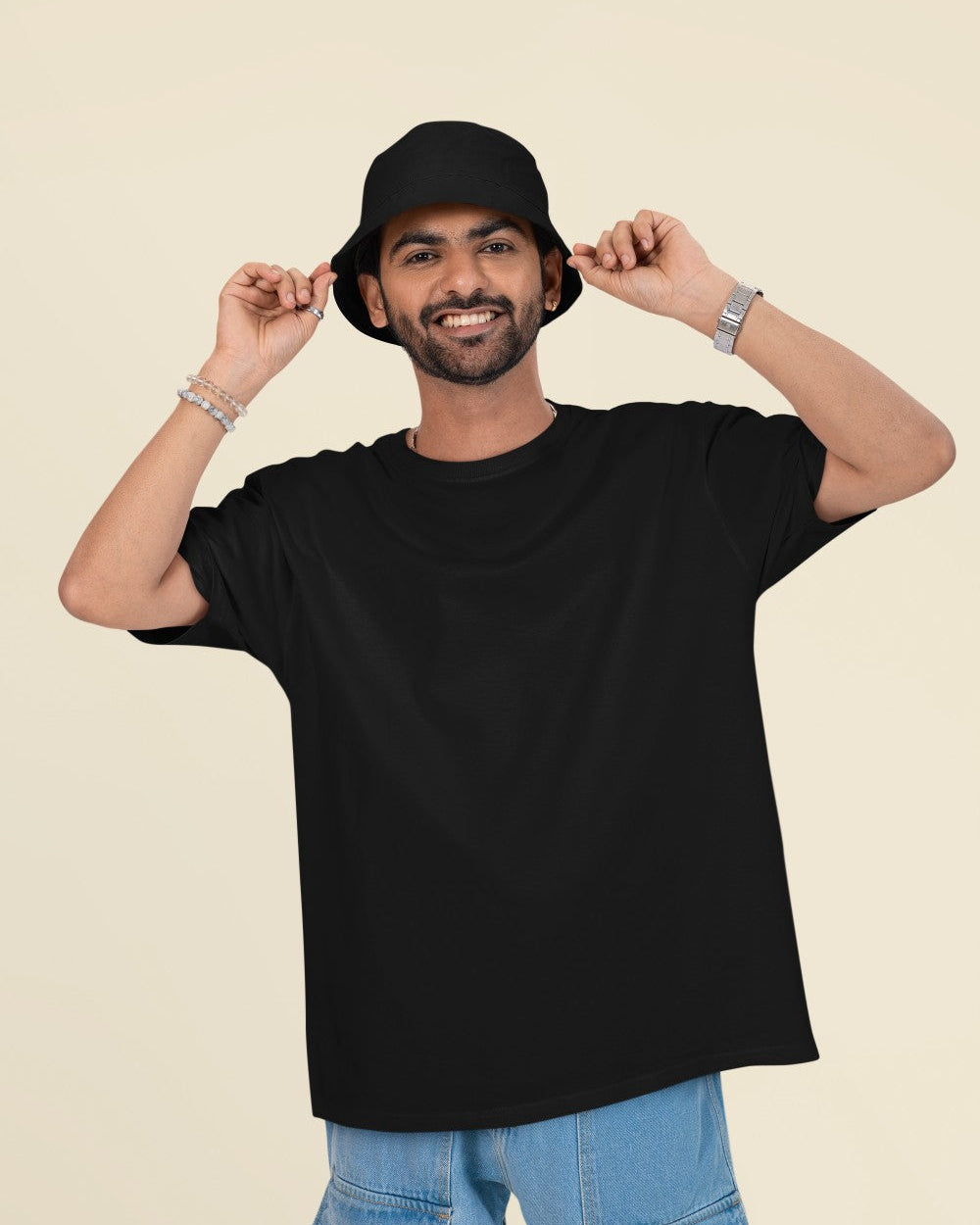 Male Model wearing the Black oversized plain t-shirt for a casual look.