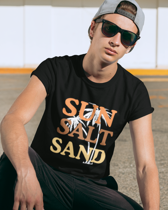 Men Model wearing the Sun Salt Sand Printed Black T-Shirt, paired with jeans for a casual summer look.