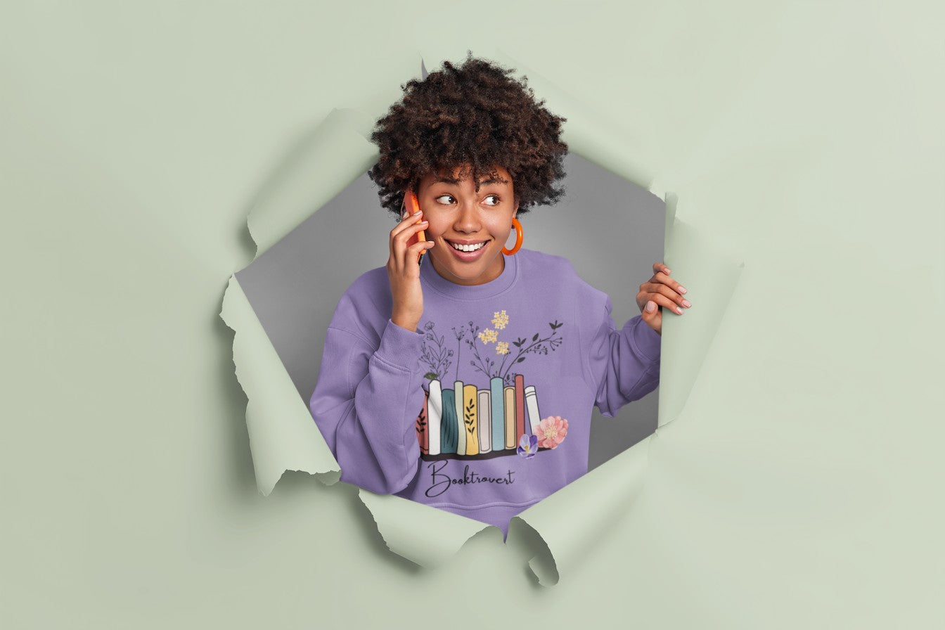 Model wearing the Women's Brooktrovert Printed Lavender Sweatshirt, styled casually with jeans for a relaxed look.