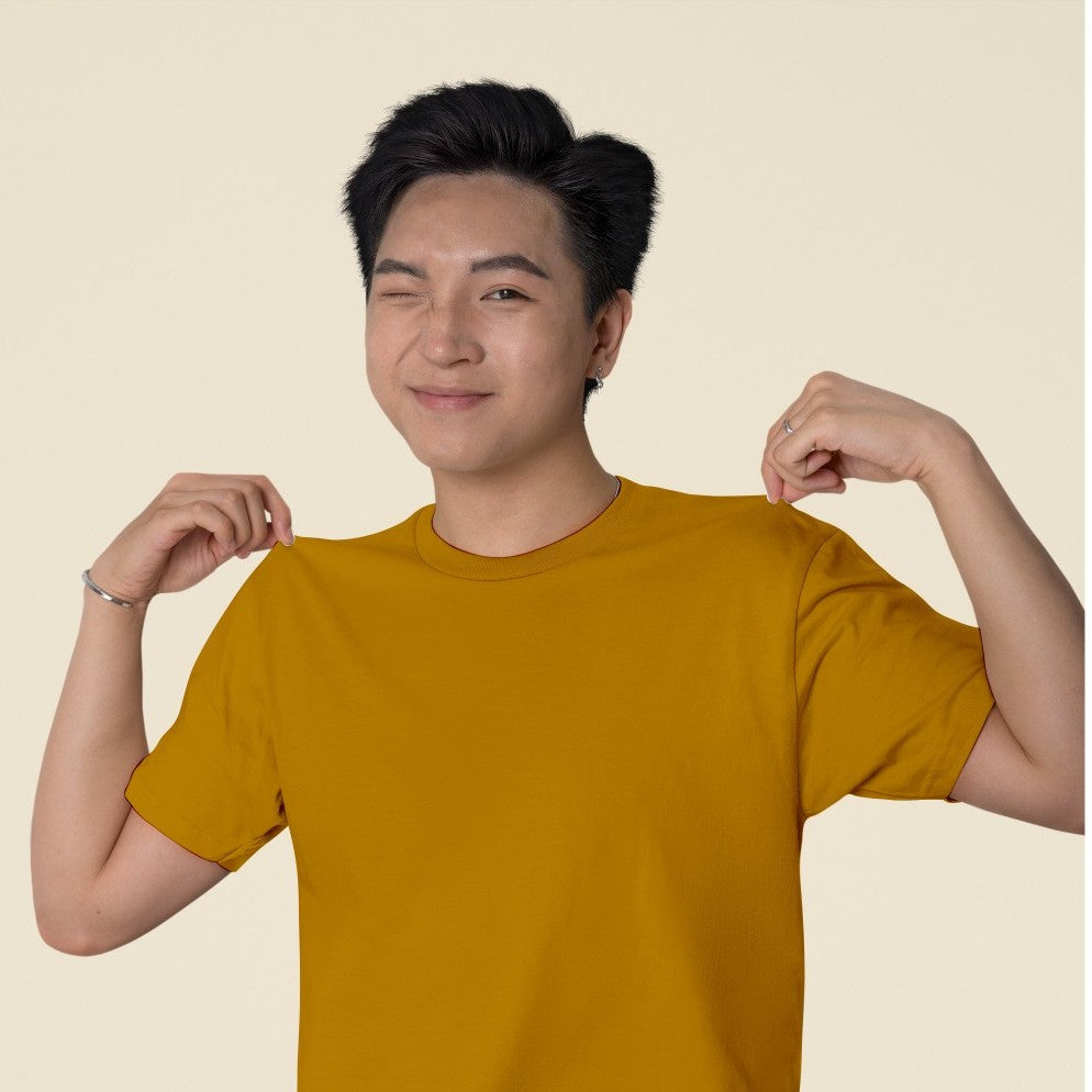 Male Model wearing the Mustard Yellow plain t-shirt.
