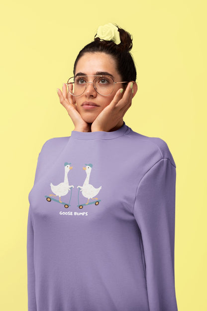 Close-up of the Goose Bumps print detailing on the lavender sweatshirt
