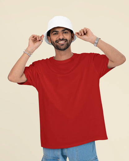 Male Model wearing the Red  oversized plain t-shirt for a casual look.