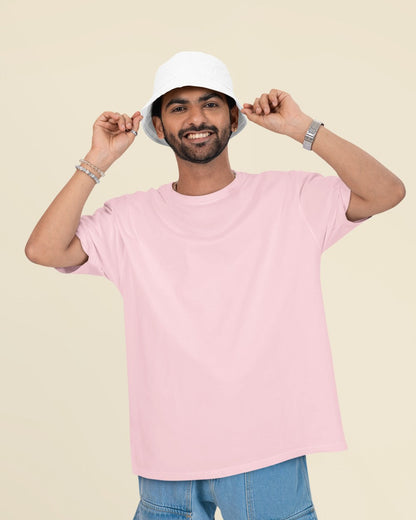 Male Model wearing the Pink oversized plain t-shirt for a casual look.