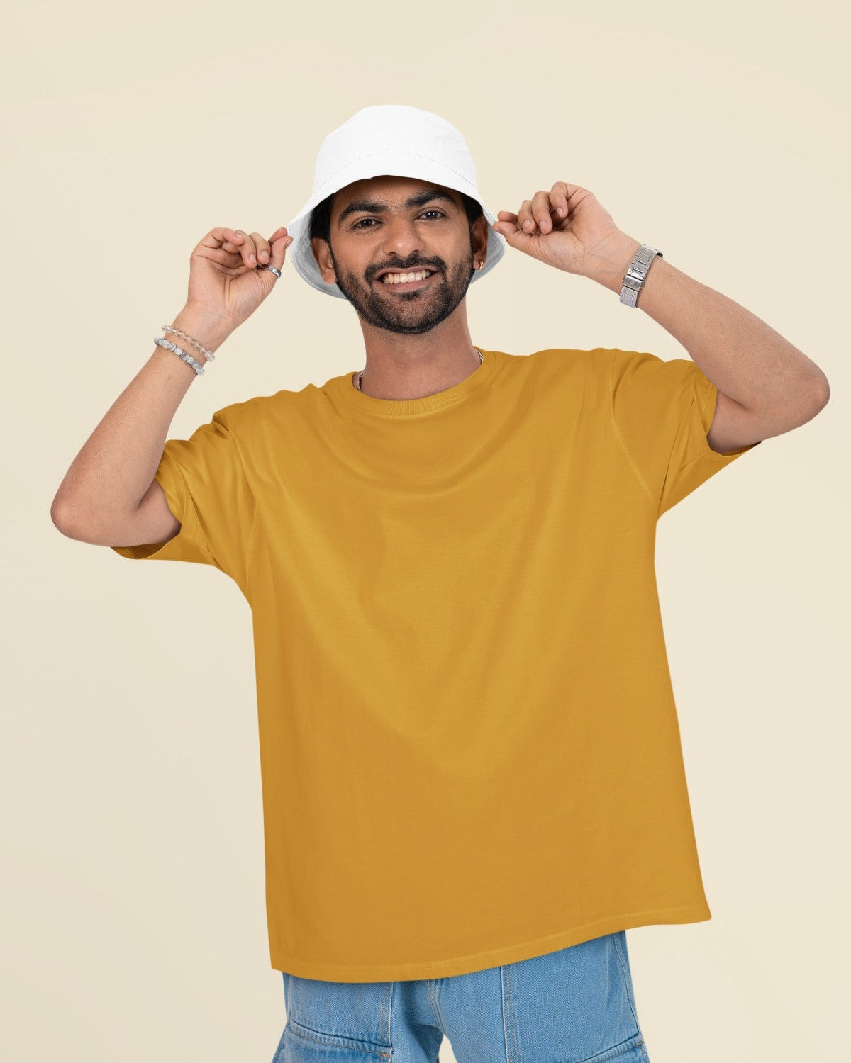 Male Model wearing the Mustard Yellow oversized plain t-shirt for a casual look.