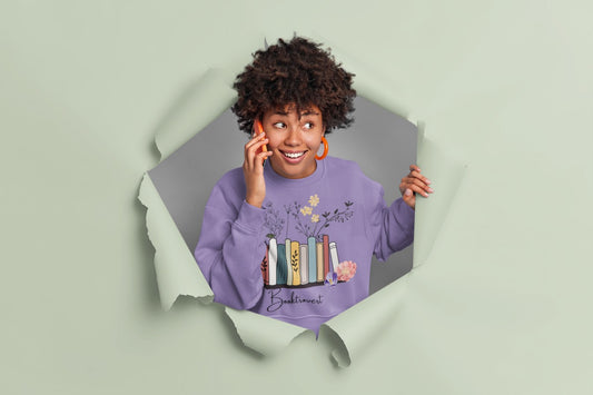 Model wearing the Women's Brooktrovert Printed Lavender Sweatshirt, styled casually with jeans for a relaxed look.