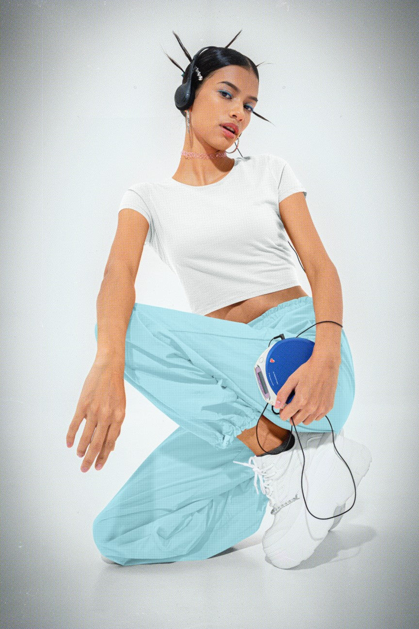 bella canvas crop top mockup featuring a woman with a 00 s music player m31208 bella canvas crop top mockup featuring a woman with a 00 s music player m31208