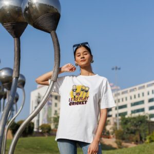 blinkstore t shirt mockup featuring a woman posing in the street with a casual look m40964