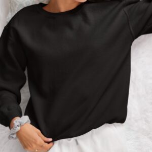 gildan sweatshirt mockup featuring a smiling cropped face woman lying on a bed m37306 2
