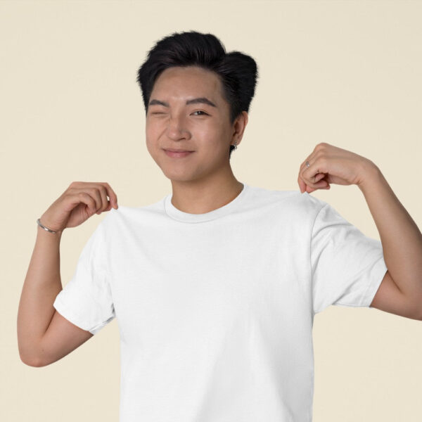 Catalog mockup featuring a man showing off his bella canvas t shirt m40241 1