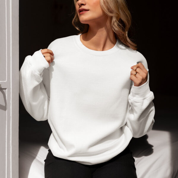 Catalog mockup of a woman wearing a sweatshirt at home while getting sun rays m37286
